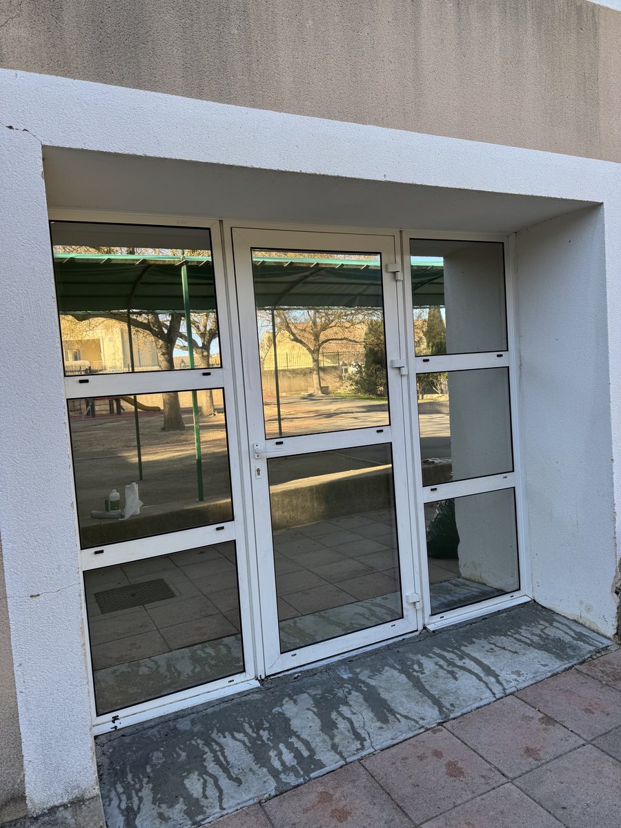 Pose film solaire habitation baie vitrée PACA — Teintée +