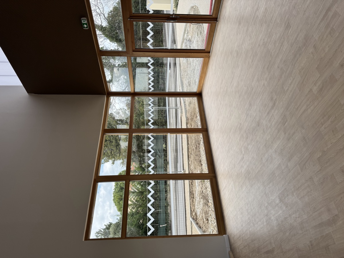 Bandes de signalétique ERP sur vitrage — Teintée + PACA